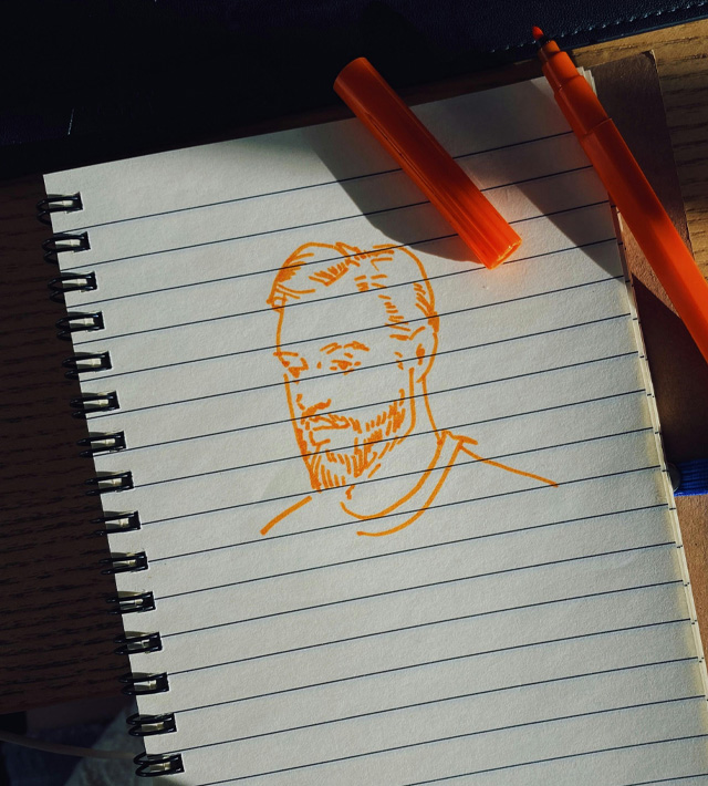 dibujo de hombre en libreta